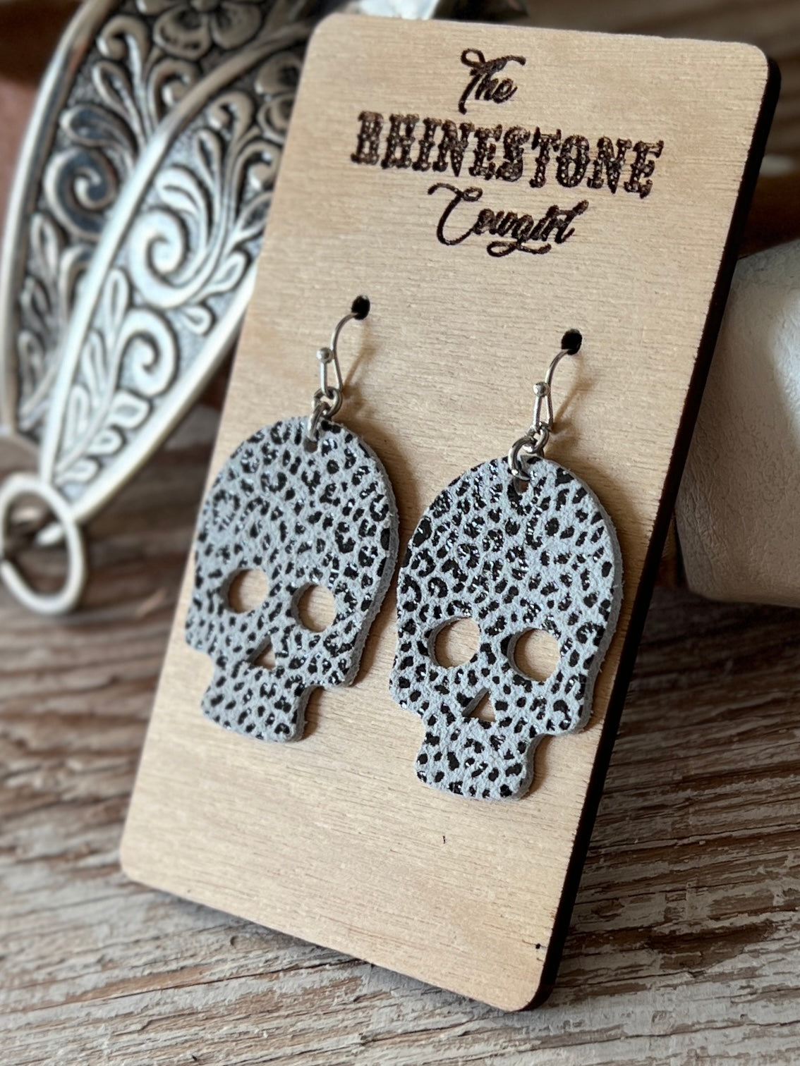 Black Metallic Baby Cheetah on White Suede Skulls
