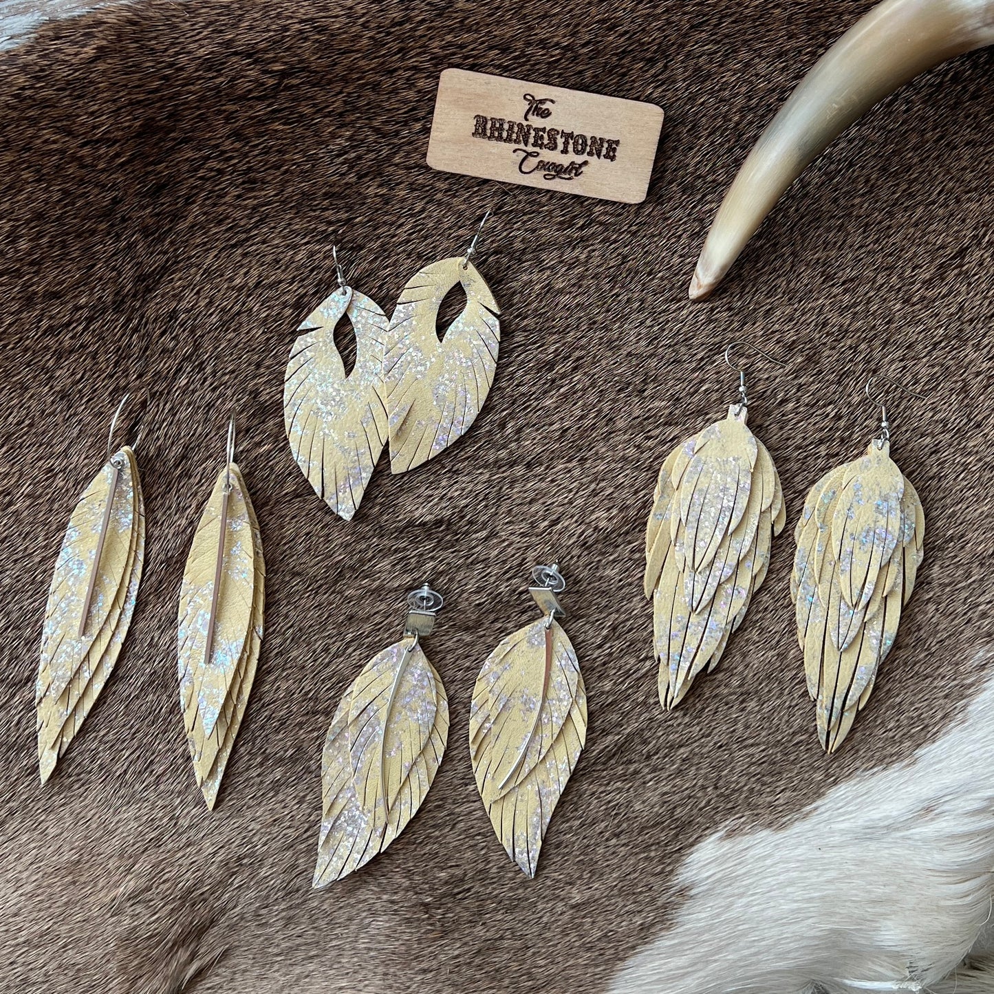 Pale Yellow with holographic splash Prairie Dove Feathers