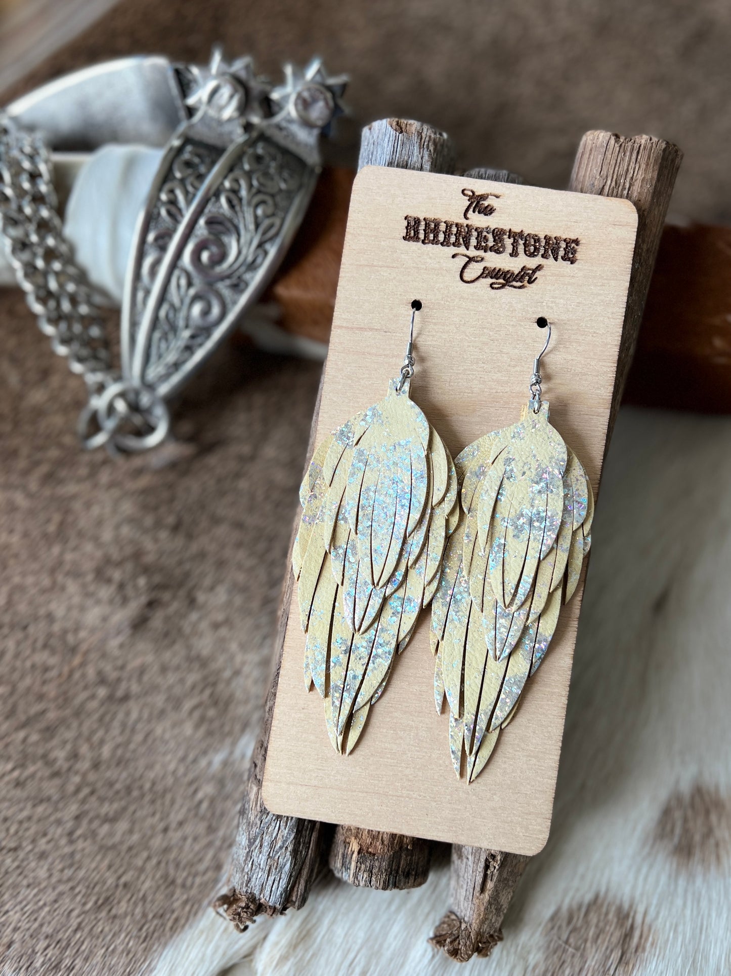 Pale Yellow with holographic splash Prairie Dove Feathers