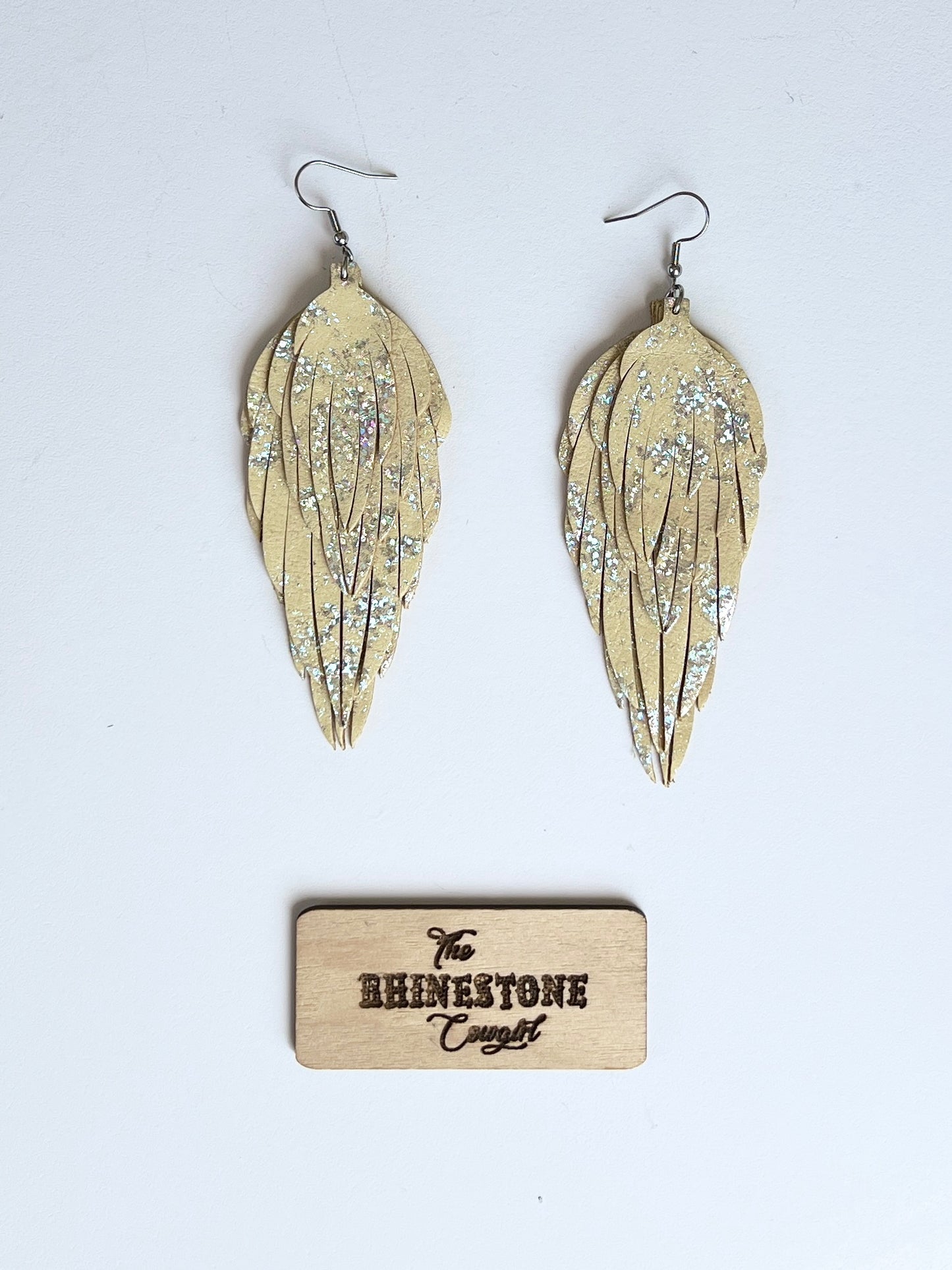 Pale Yellow with holographic splash Prairie Dove Feathers